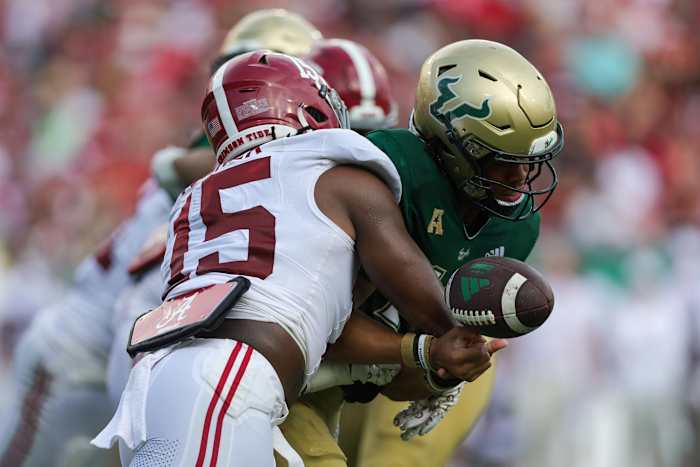 Alabama Crimson Tide linebacker Dallas Turner (15) forces a fumble by South Florida Bulls quarterback Byrum Brown (17). Mandatory Credit: Nathan Ray Seebeck-USA TODAY Sports